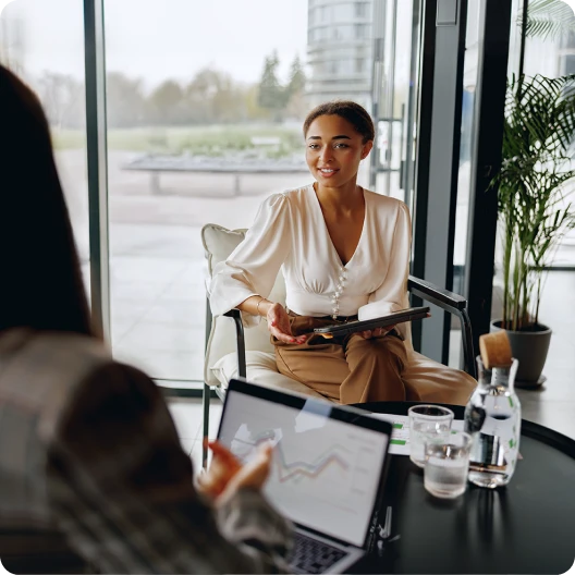 Young woman getting advice from an advisor 