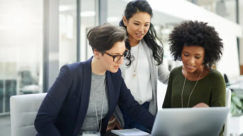Women looking at computer