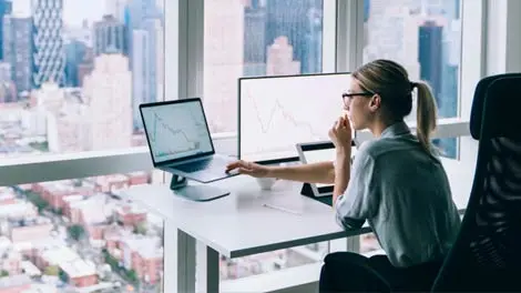 photo of business woman handling investment portfolio