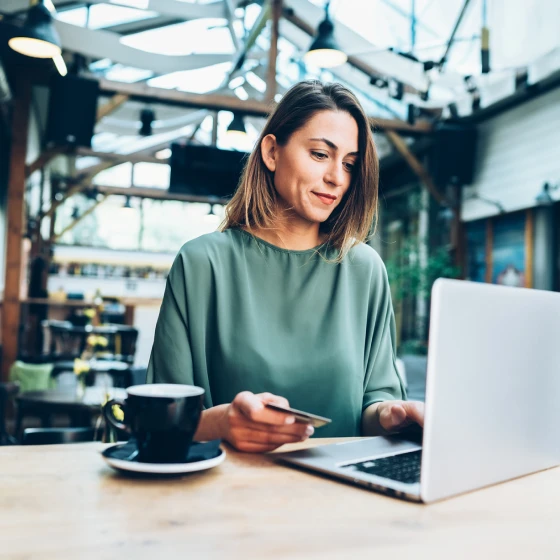 Middle-aged couple meeting virtually with her financial advisor