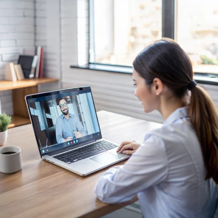 Woman meeting virtually with her financial advisor