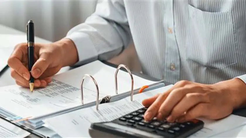 Photo of hands working at desk