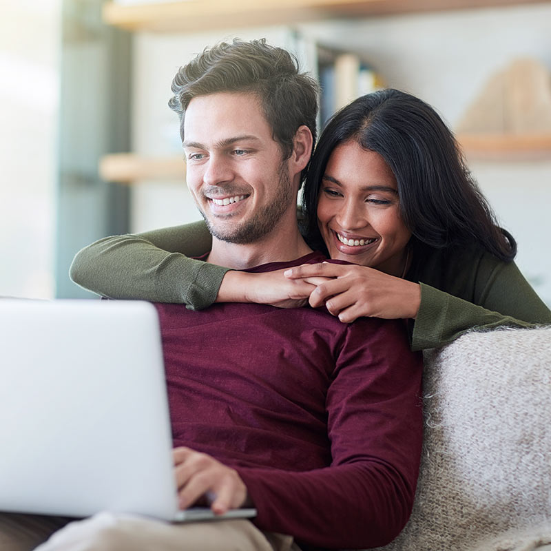 Couple enjoying free time while earning interest on their accounts