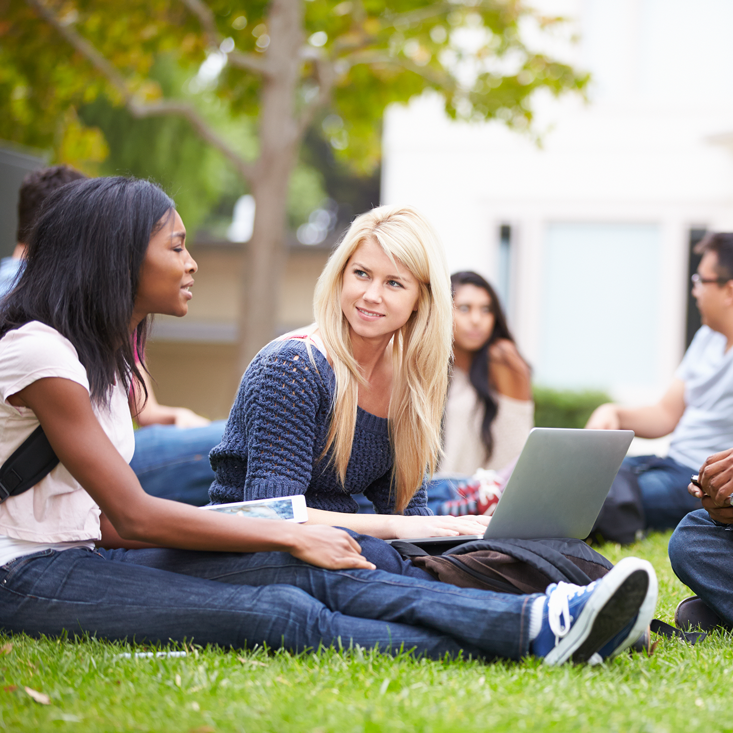 Women reviewing Student Checking account benefits