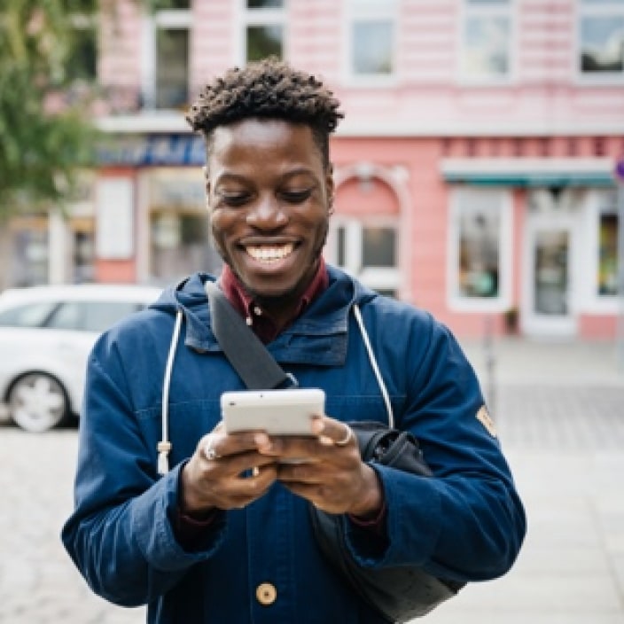 Man on the go using a smartphone