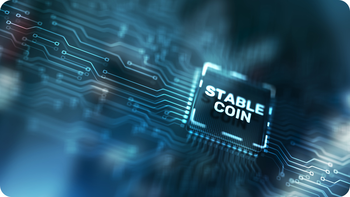 An abstract photo of digital finance with the word stablecoin