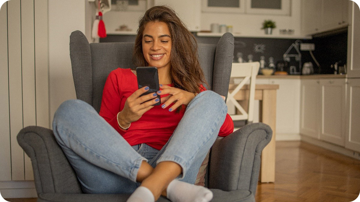 A woman using her mobile phone.