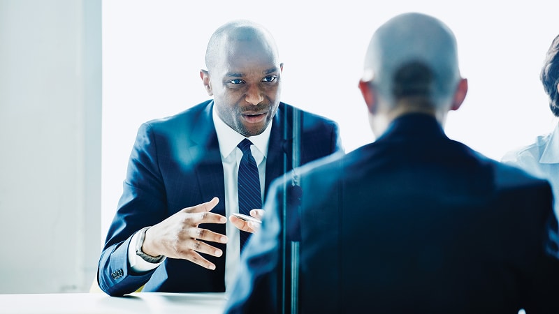 Financial advisor discussing European ETF exchange traded funds with a client