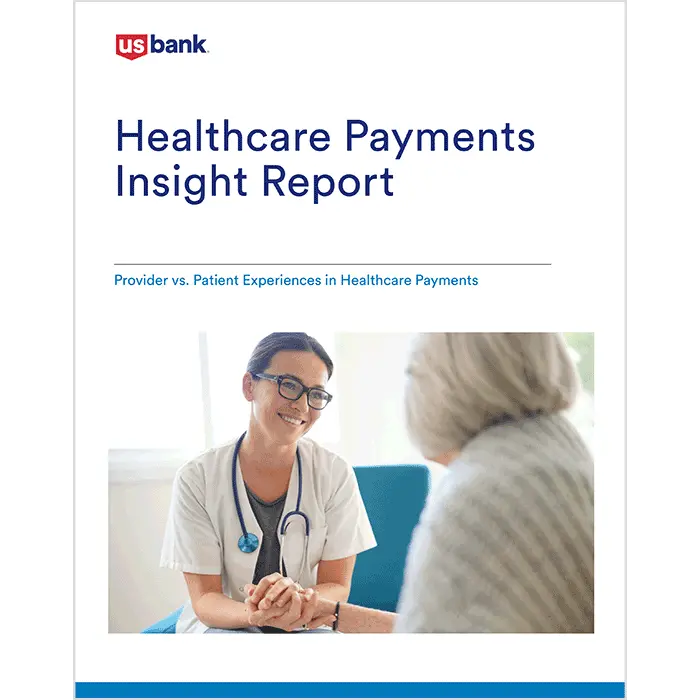 Doctor with stethoscope holding a patient’s hand