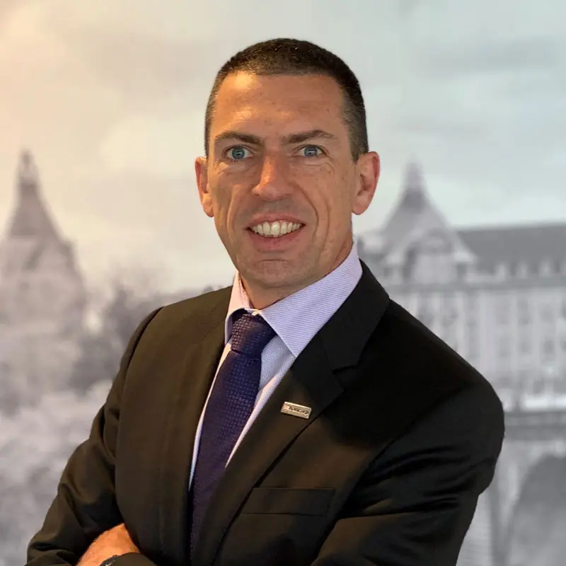 Headshot of Didier Delvaux