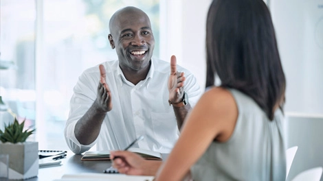 Woman discussing wealth management with her advisor