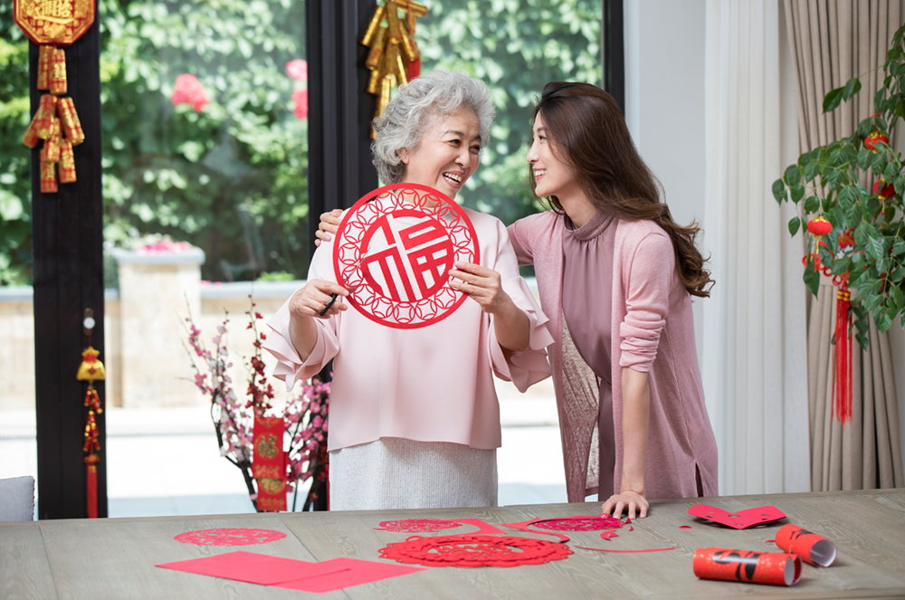 a mother and daughter celebrating Lunar New Year