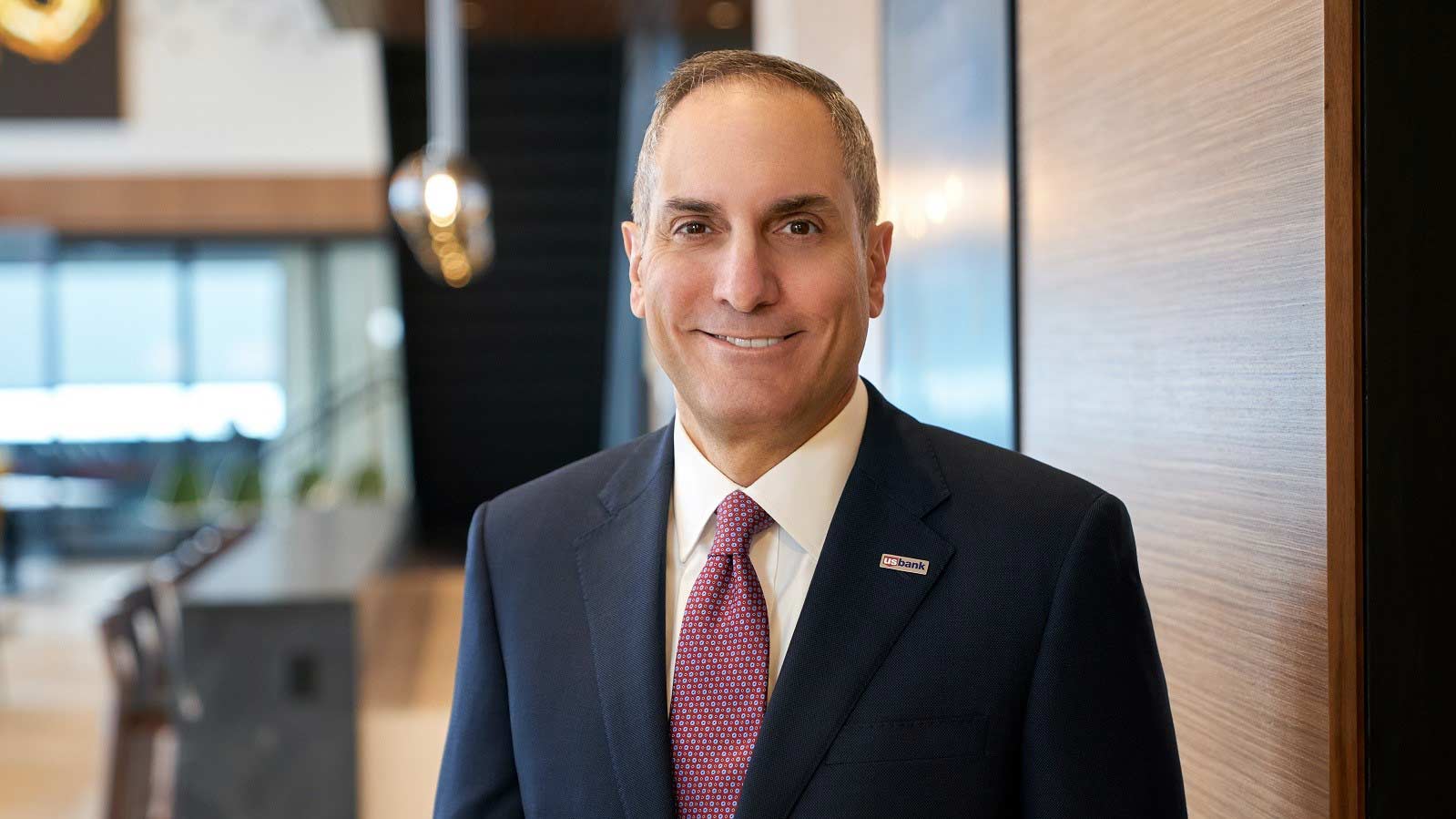 U.S. Bank CEO Andy Cecere smiling in an office environment