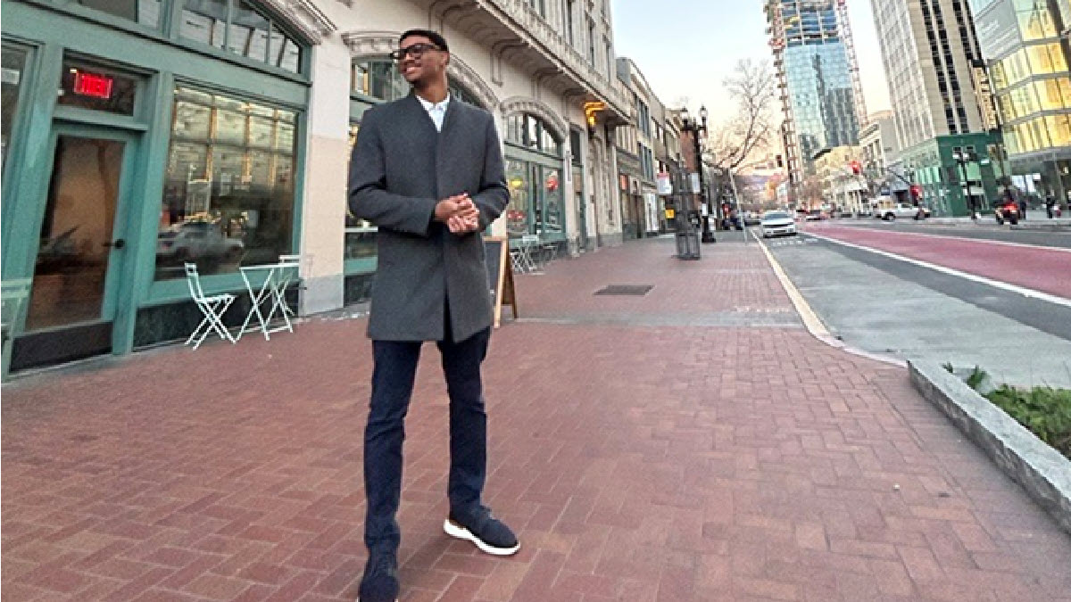 Picture of Gensys graduate Chris Ward standing on a sidewalk in Oakland, California