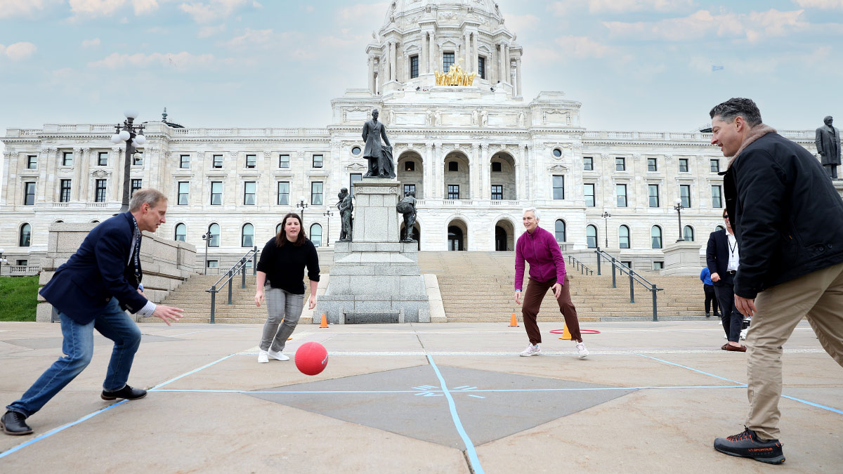 People playing four square outside the Minnesota state capital