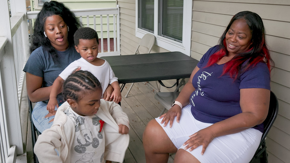 Melody Jones and her family members at the home she purchased with help from U.S. Bank