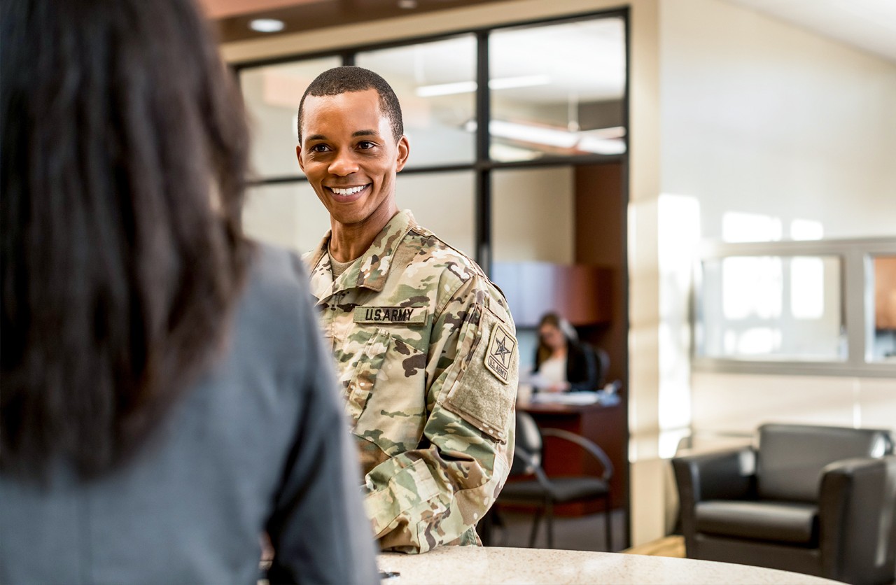 Man smiling after opening a Military Checking account