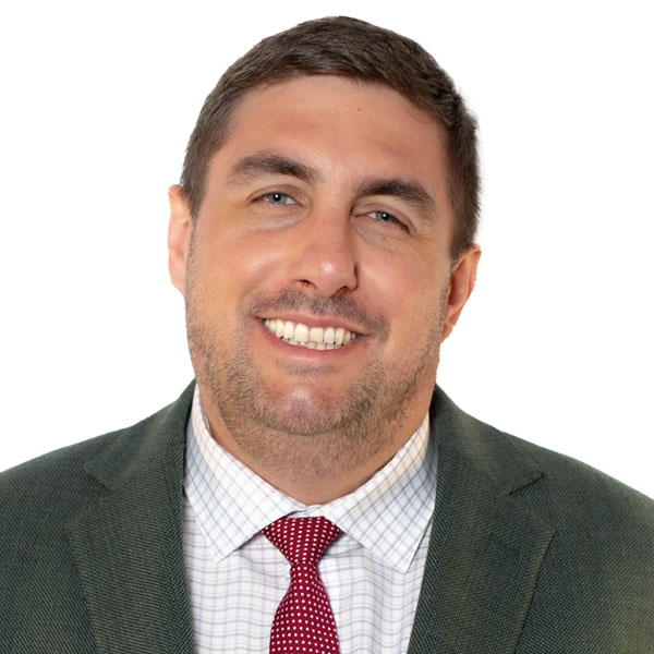 headshot of Paul Abuzalaf